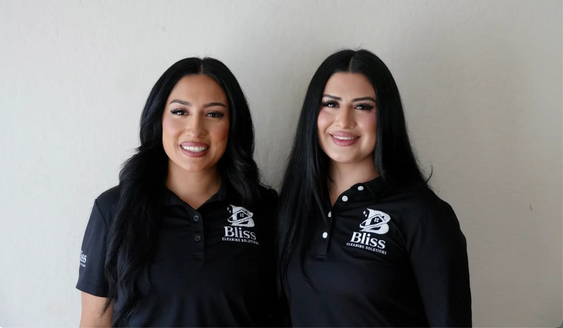 The Bliss Cleaning Solutions team in their branded uniforms